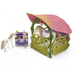 Casa de Flores brillante con unicornios, lago y establo